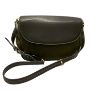 a black and brown cross body bag with a strap