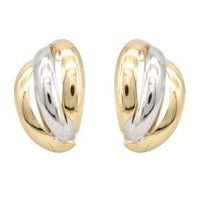 a pair of earrings in two tone gold and silver