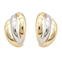 a pair of earrings in two tone gold and silver