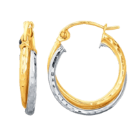 a pair of gold and silver hoop earrings