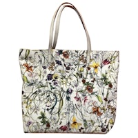 a white tote bag with flowers on it