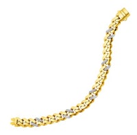 a yellow gold bracelet with diamonds