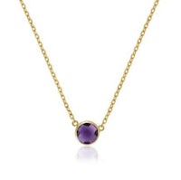 an amethyst stone necklace on a gold chain