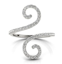 a white gold spiral ring with diamonds