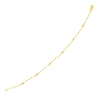 a yellow gold bracelet with diamonds