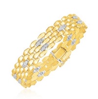 a yellow gold bracelet with diamonds